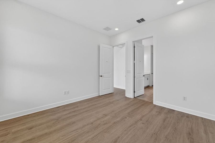 Representative unfurnished interior of a home built from the Sereno by Taylor Morrison in Esplanade by the Islands, Naples (Image 9).