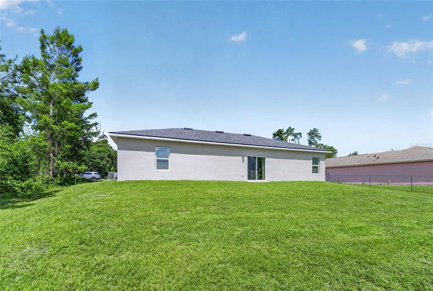 Exterior details and patio area of a home in , Ocala (Image 3).