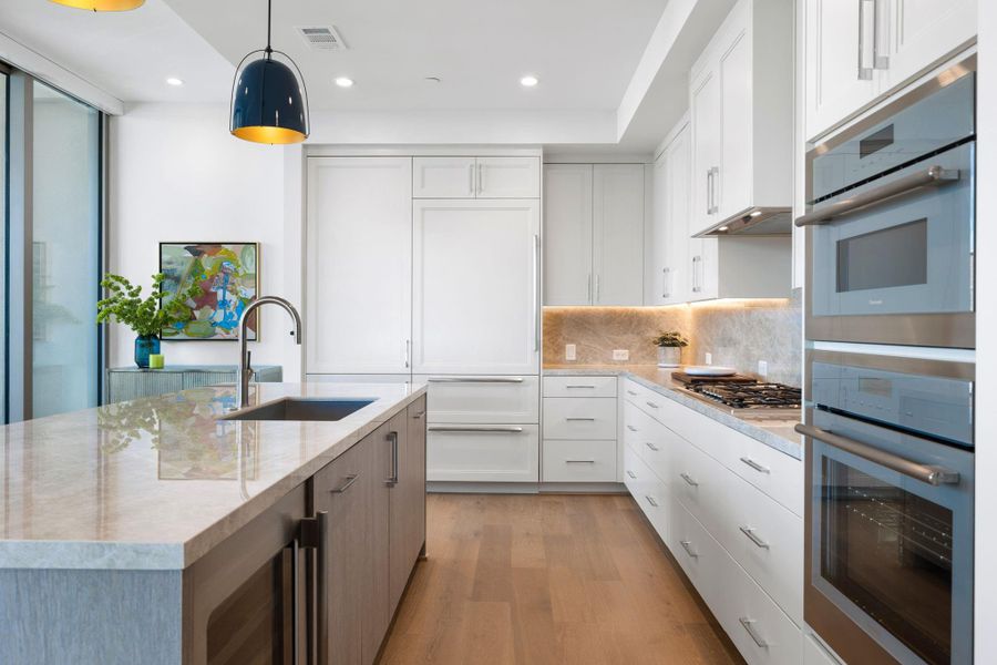 Abundant storage space woth custom-built soft closing cabinetry and drawers