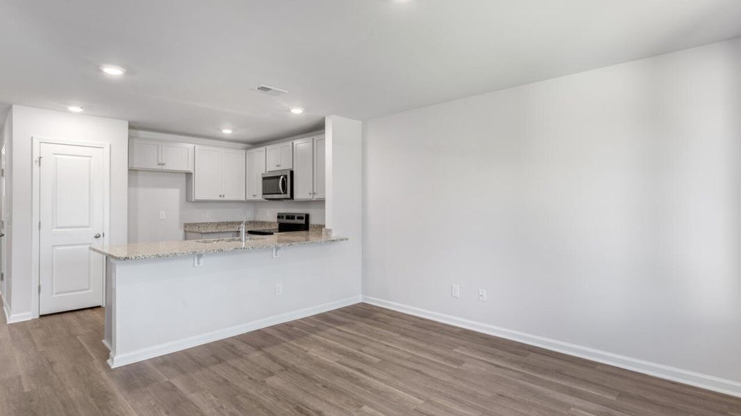Spacious, unfurnished interior of a new home in Waterside Townhomes, Surf City (Image 17).