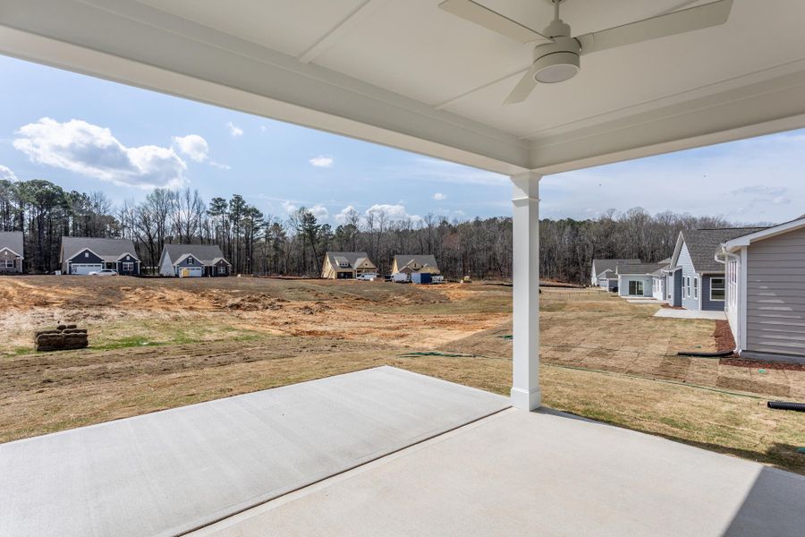 Exterior details and patio area of a home in The Enclave at Hidden Lake - 55+ Community, Youngsville (Image 3).