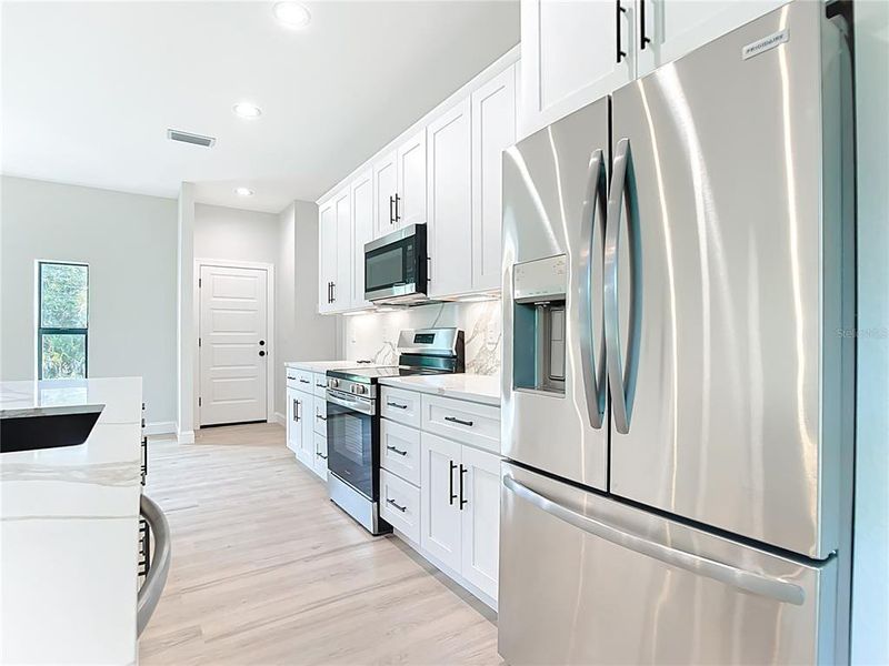 Furnished interior view inside a new home in , Englewood (Image 6).