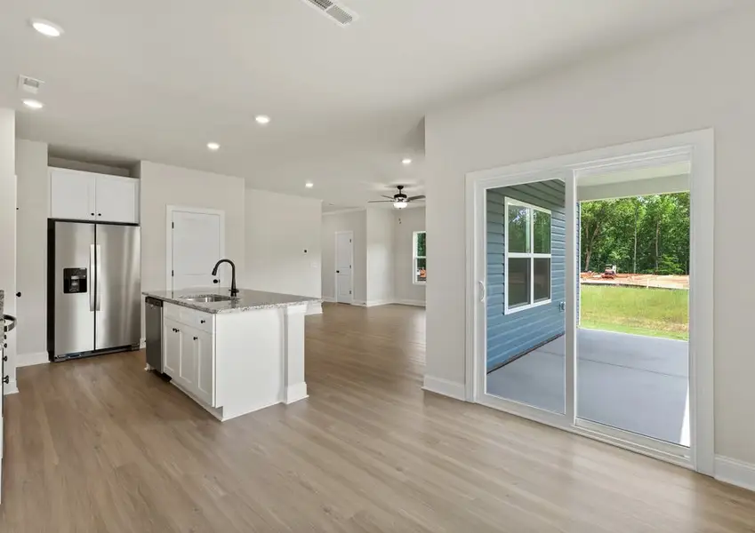 The kitchen overlooks the dining area