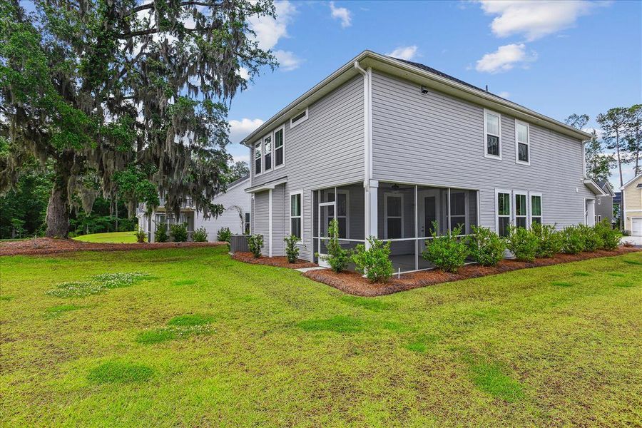 Front exterior of a new home in Windsor Crossing, North Charleston, SC, highlighting curb appeal (Image 20). Front exterior of a new home in Windsor Crossing, North Charleston, SC, highlighting curb appeal (Image 20).