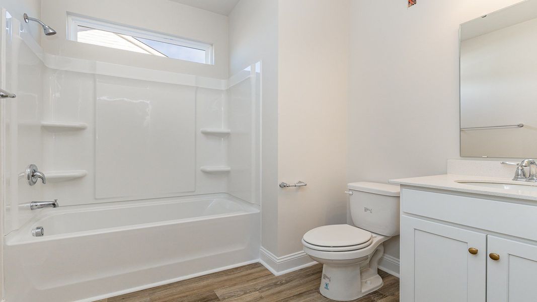 Furnished interior view inside a new home in Coastal Farms, Conway (Image 8).