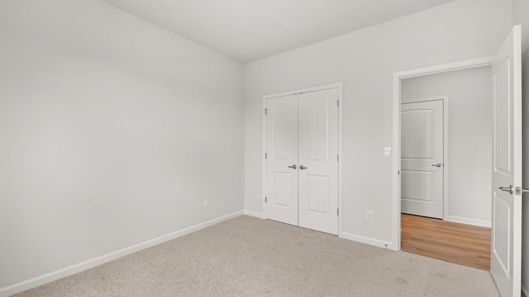 Representative unfurnished interior of a home built from the Denton by D.R. Horton in Fairway 17 at Mirror Lake, Villa Rica (Image 35). Representative unfurnished interior of a home built from the Denton by D.R. Horton in Fairway 17 at Mirror Lake, Villa Rica (Image 35).