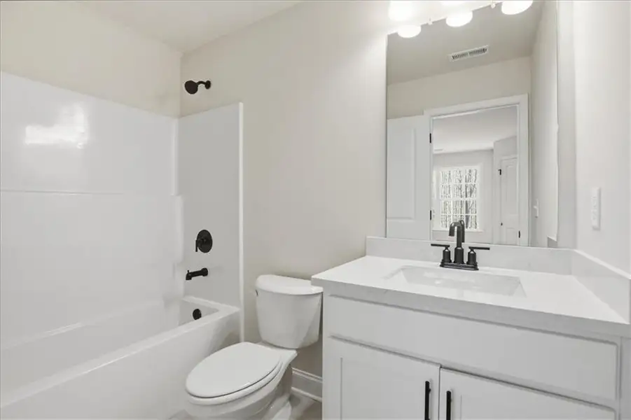 Furnished interior view inside a new home in Bradley Gin, Monroe (Image 15).