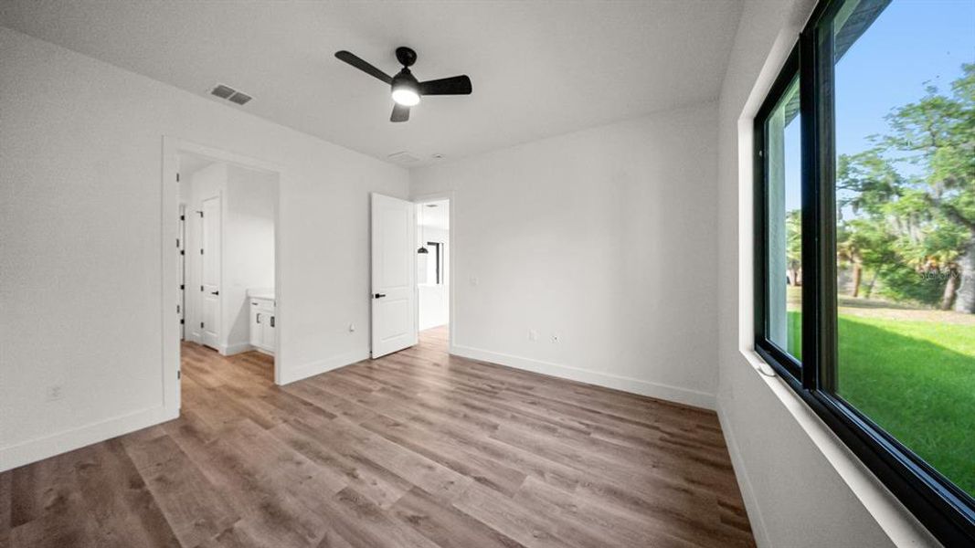 Spacious, unfurnished interior of a new home in , Port Charlotte (Image 33).