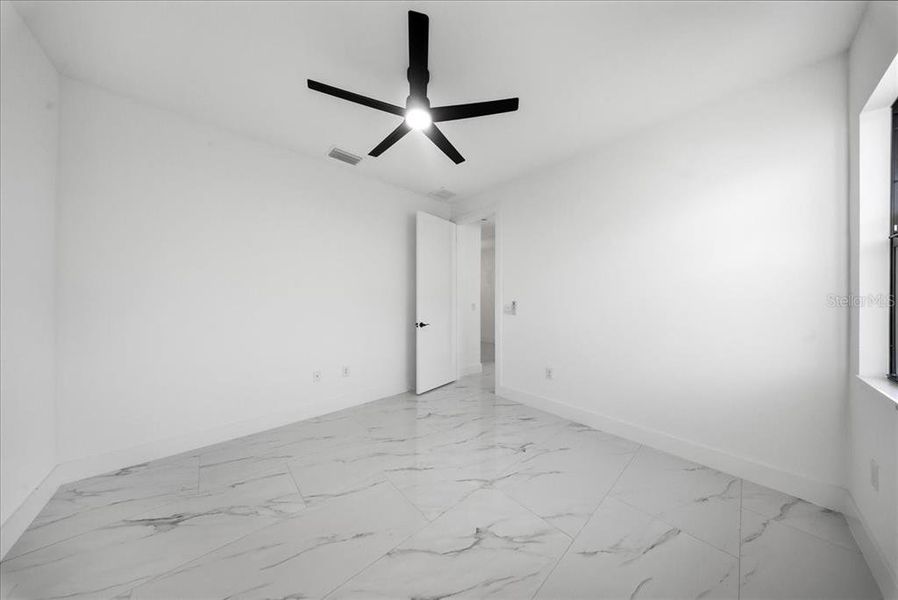 Spacious, unfurnished interior of a new home in , Punta Gorda (Image 12).