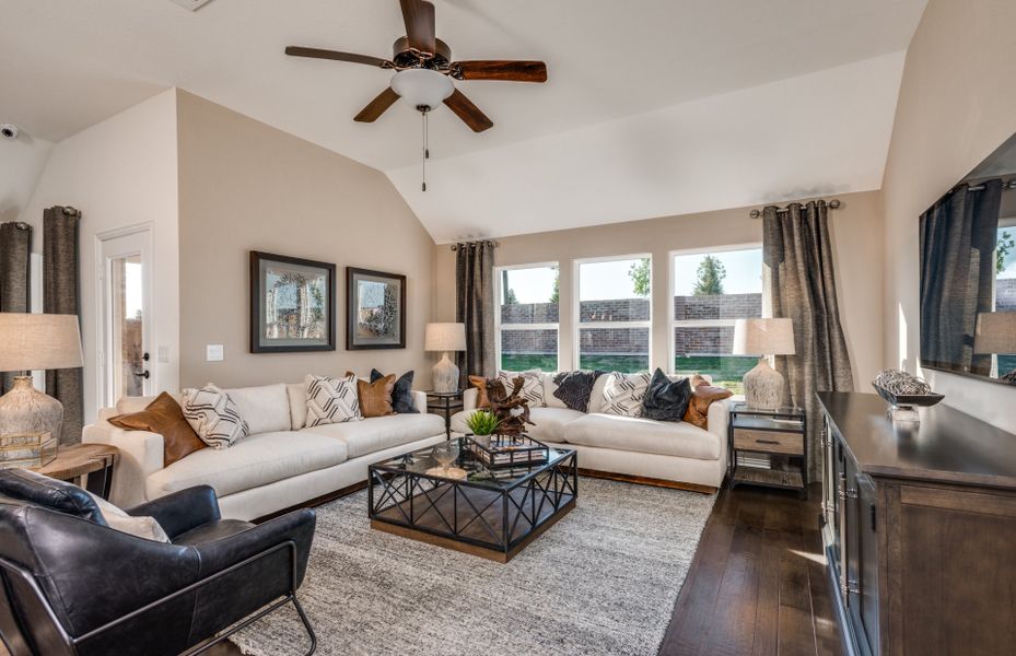 Gathering Room Opens to Kitchen with Backyard View