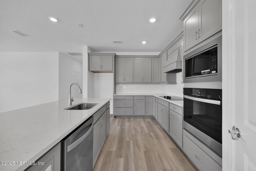 Furnished interior view inside a new home in Hyland Trail, Green Cove Springs (Image 13).