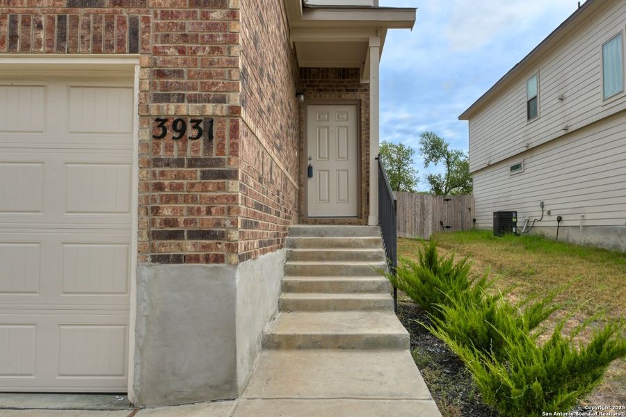 Front exterior of a new home in Somerset Trails, San Antonio, TX, highlighting curb appeal (Image 20).