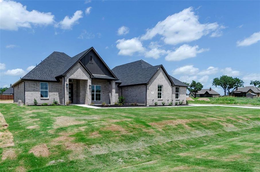 Front exterior of a new home in , Paradise, TX, highlighting curb appeal (Image 22).