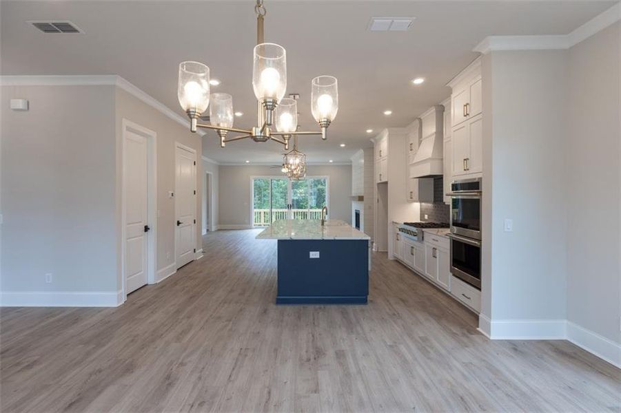 Furnished interior view inside a new home in Brackley Single Family, Cumming (Image 36).