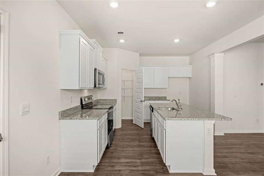 Furnished interior view inside a new home in Oakchase at Hampton, Hampton (Image 3).