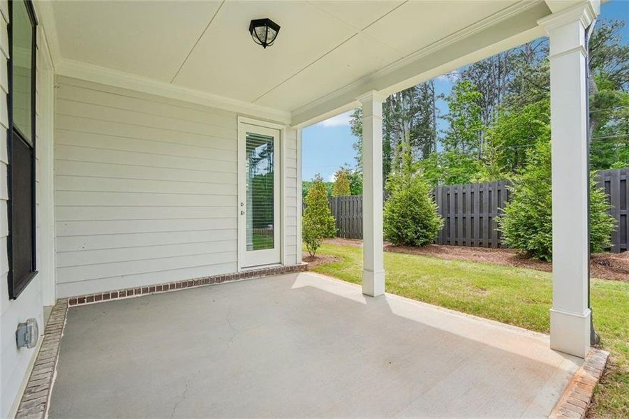 Exterior details and patio area of a home in Promenade at Sawnee Village, Cumming (Image 29). Exterior details and patio area of a home in Promenade at Sawnee Village, Cumming (Image 29).
