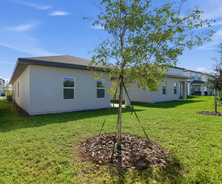 Exterior details and patio area of a home in Catamaran Cove, Rockledge (Image 3).