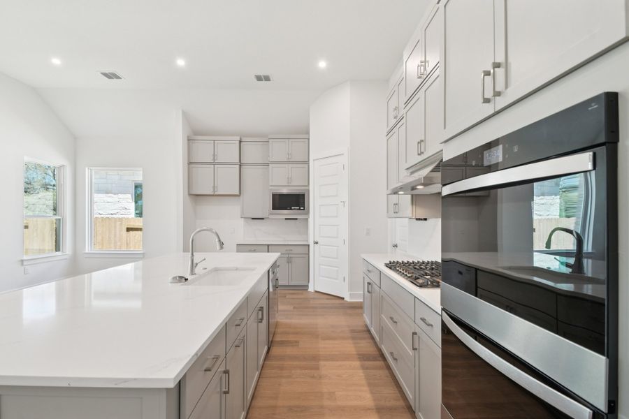 Furnished interior view inside a new home in Persimmon, Buda (Image 4).