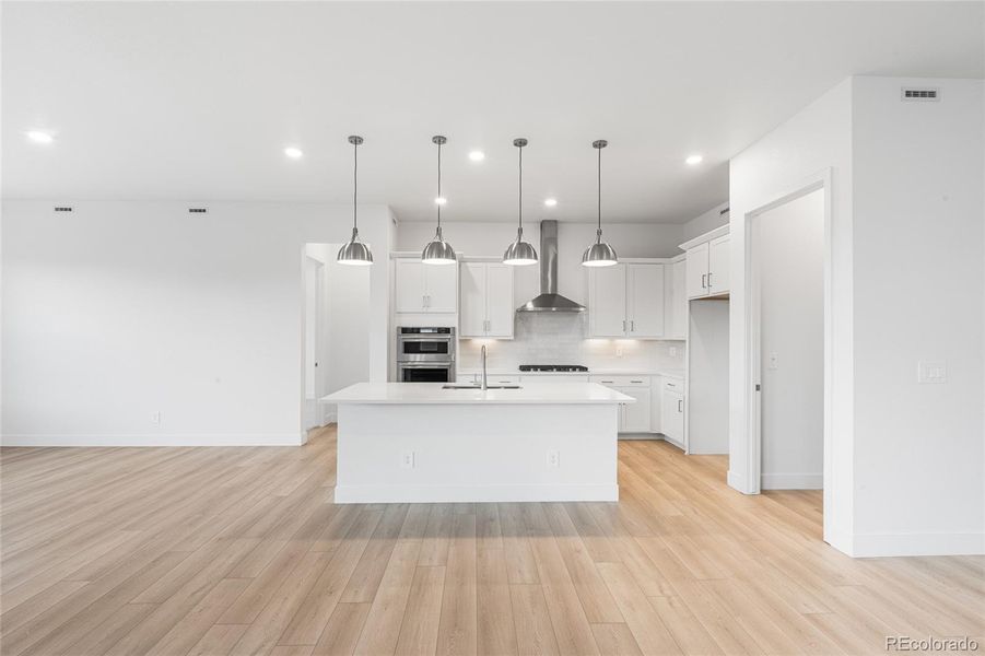 Furnished interior view inside a new home in Hilltop at Inspiration, Aurora (Image 8).