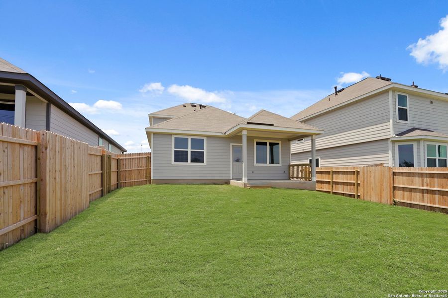 Front exterior of a new home in Hickory Ridge, Elmendorf, TX, highlighting curb appeal (Image 15).