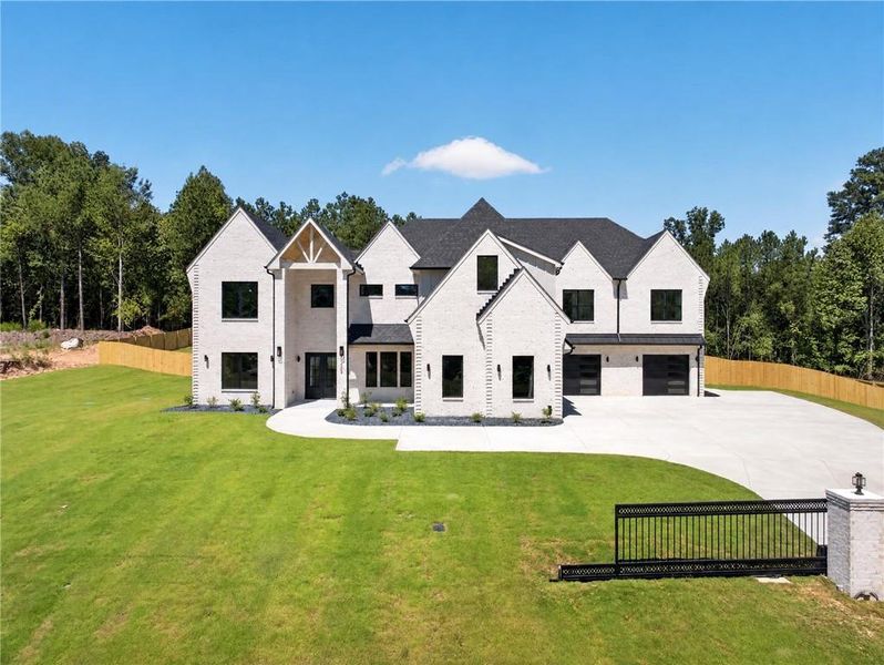 Front exterior of a new home in , Dacula, GA, highlighting curb appeal (Image 30).