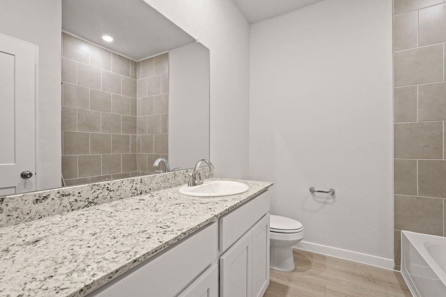 Furnished interior view inside a new home in Lakes at Crockett Martin, Conroe (Image 12).