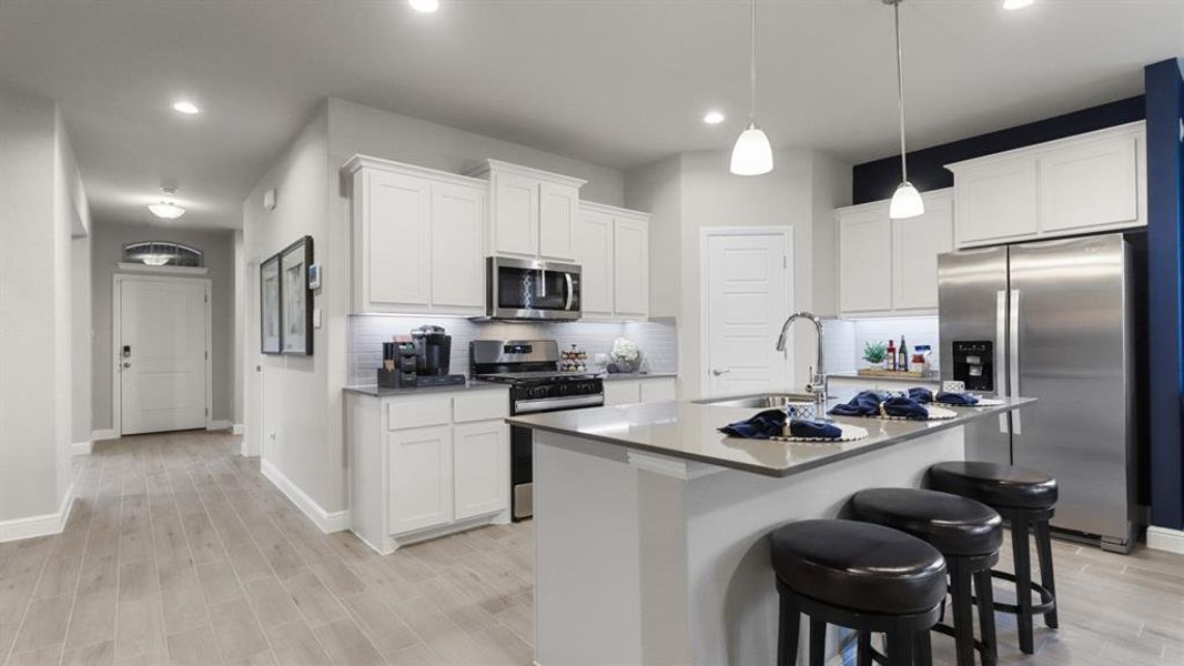 Kitchen - All Home and community information, including pricing, included features, terms, availability and amenities, are subject to change at any time without notice or obligation. All Drawings, pictures, photographs, video, square footages, floor plans, elevations, features, colors and sizes are approximate for illustration purposes only and will vary from the homes as built. Kitchen - All Home and community information, including pricing, included features, terms, availability and amenities, are subject to change at any time without notice or obligation. All Drawings, pictures, photographs, video, square footages, floor plans, elevations, features, colors and sizes are approximate for illustration purposes only and will vary from the homes as built.