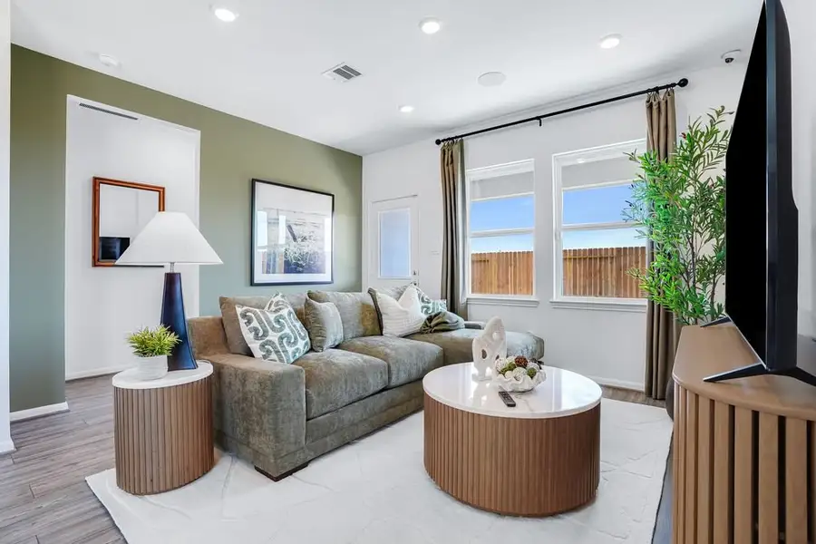 Furnished interior view inside a new home in Mason Woods, Cypress (Image 3).