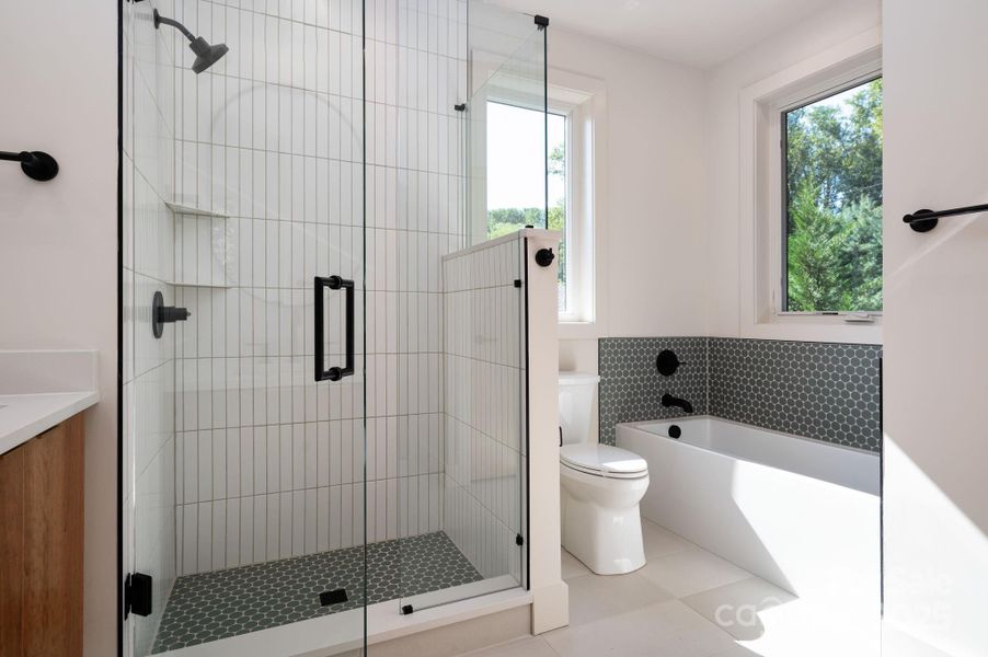 Tiled, Walk-In Shower and Tile-Surround Soaking Tub Tiled, Walk-In Shower and Tile-Surround Soaking Tub