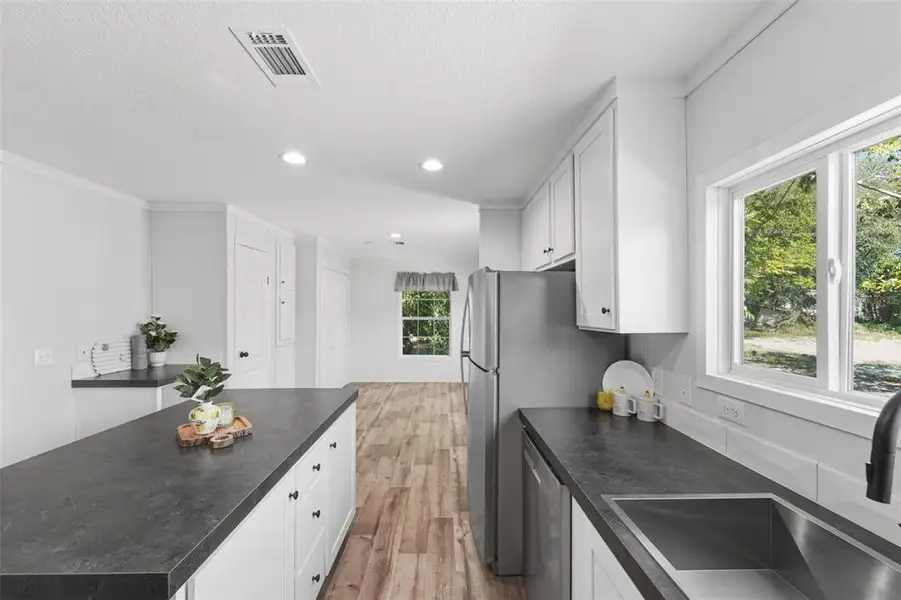 Furnished interior view inside a new home in , Deland (Image 3).