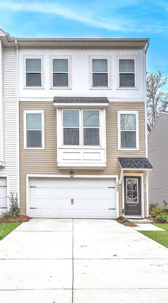 Front exterior of a new home in , Hanahan, SC, highlighting curb appeal (Image 23).
