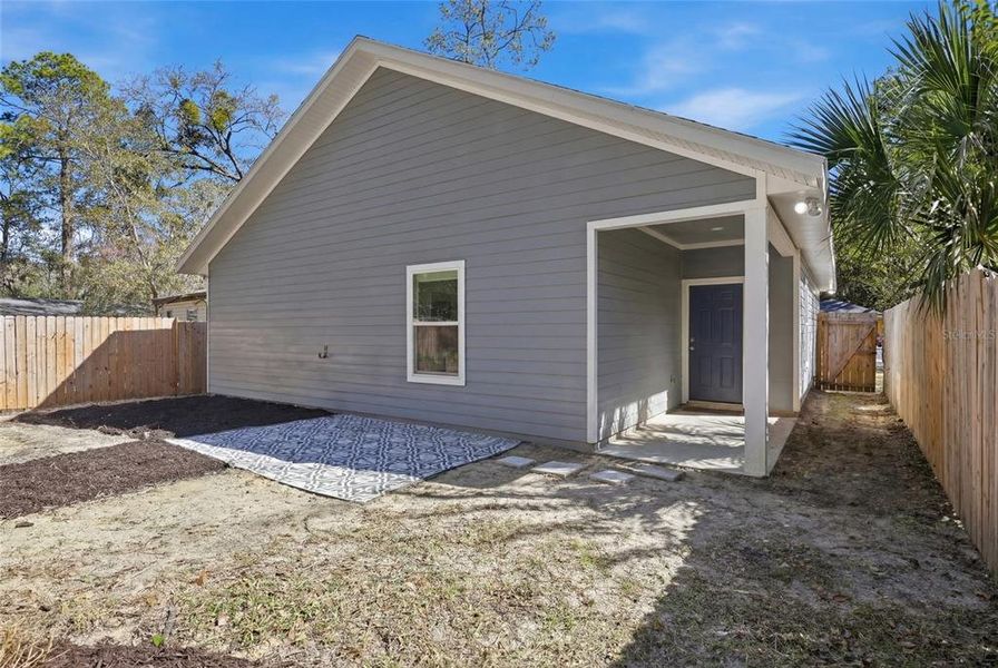 Exterior details and patio area of a home in , Gainesville (Image 3).