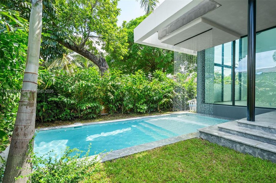 Exterior details and patio area of a home in , Miami (Image 3). Exterior details and patio area of a home in , Miami (Image 3).