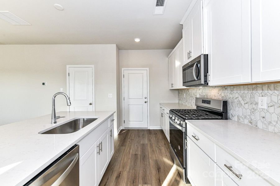 Furnished interior view inside a new home in Shepherds Landing, Mooresville (Image 7).