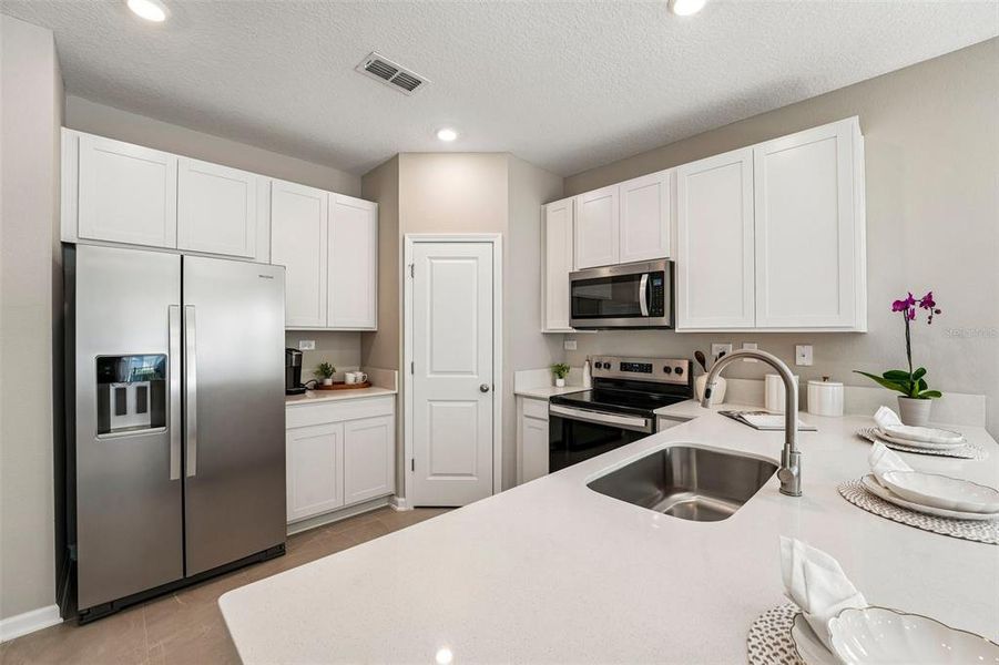 Furnished interior view inside a new home in , Jacksonville (Image 21). Furnished interior view inside a new home in , Jacksonville (Image 21).