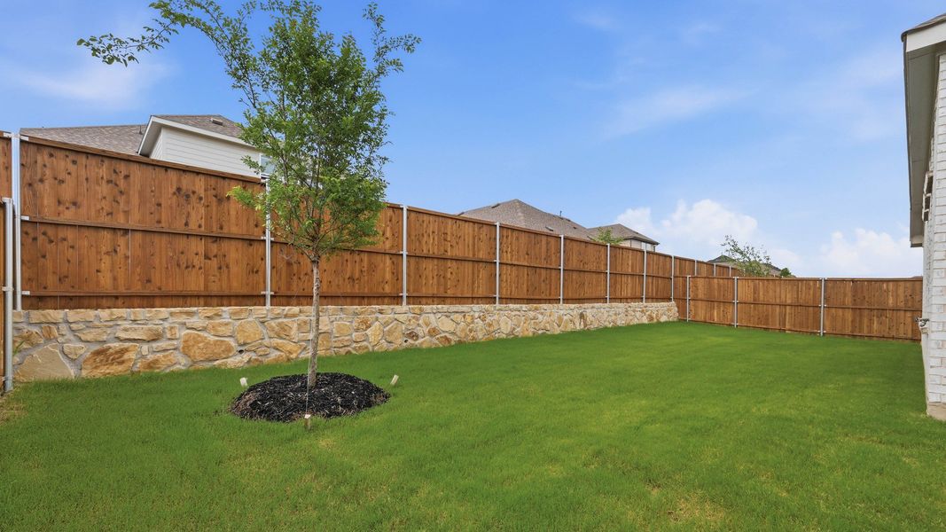 Exterior details and patio area of a home in Anna Ranch, Anna (Image 21).