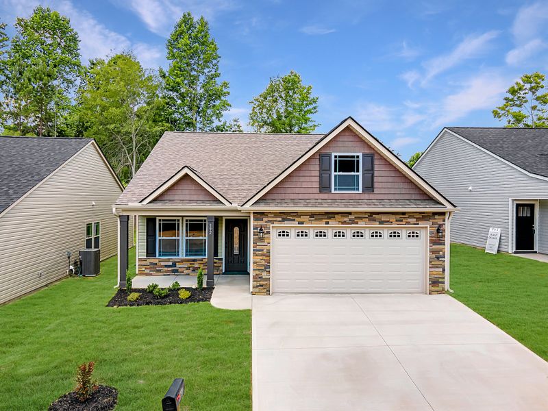 Representative exterior photo of a completed home built from the Wellford by Enchanted Homes in Hampshire Heights, Moore, SC (Image 19).