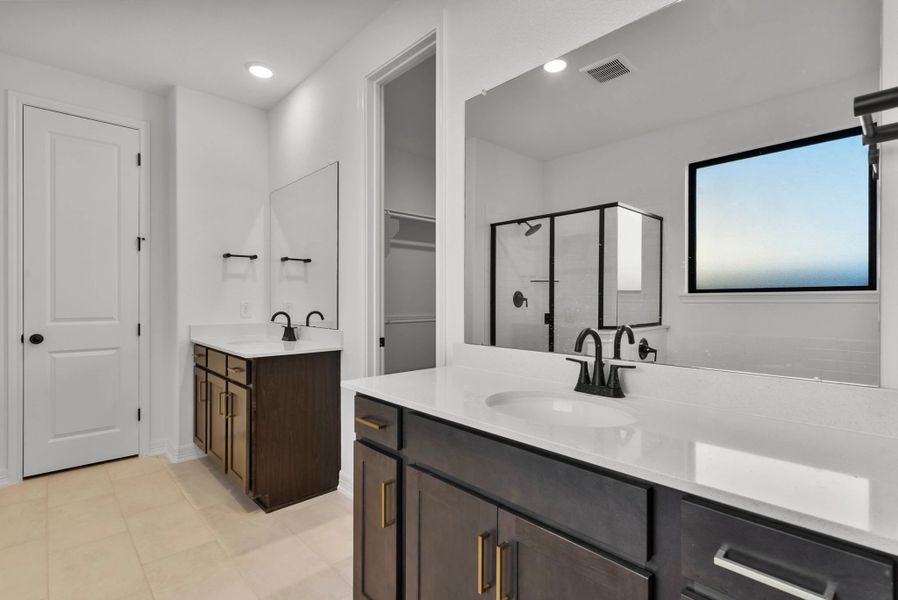 Primary bathroom. Sample product photo. Actual exterior and interior selections may vary by homesite. Photo may be virtually staged. Primary bathroom. Sample product photo. Actual exterior and interior selections may vary by homesite. Photo may be virtually staged.