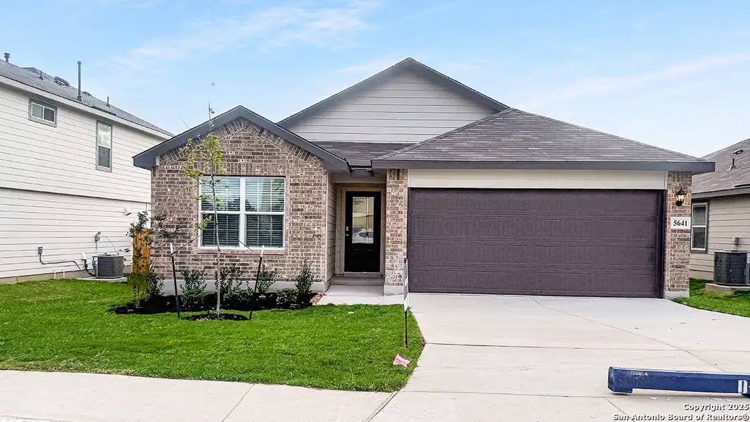 Front exterior of a new home in Stonehill, San Antonio, TX, highlighting curb appeal (Image 1). Front exterior of a new home in Stonehill, San Antonio, TX, highlighting curb appeal (Image 1).