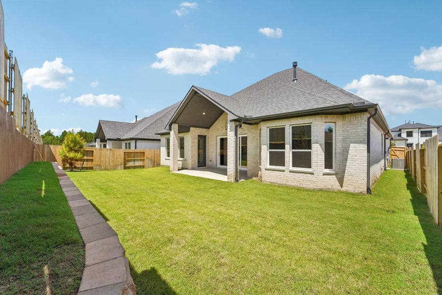 Exterior details and patio area of a home in WILDTREE 60', Montgomery (Image 26).