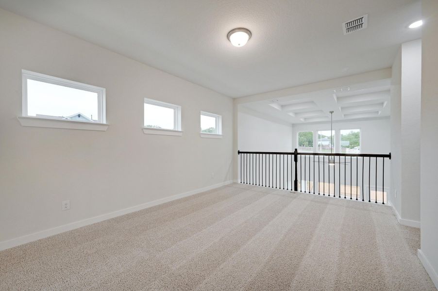 Representative unfurnished interior of a home built from the Travis by Scott Felder Homes in Crown Ridge Manor, San Antonio (Image 16).