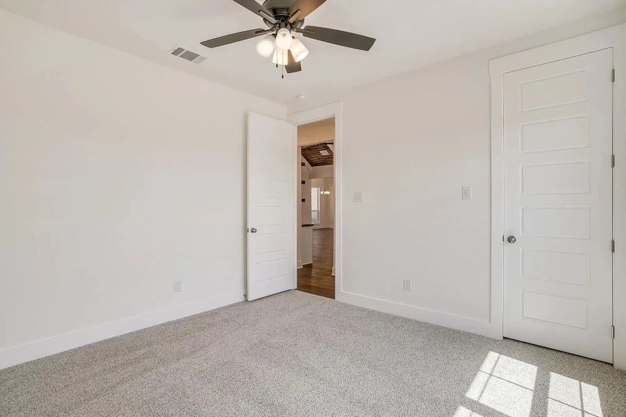 Representative unfurnished interior of a home built from the The Nathan by Elmwood Custom Homes in Ranch at Stone Hill, Waxahachie (Image 40).