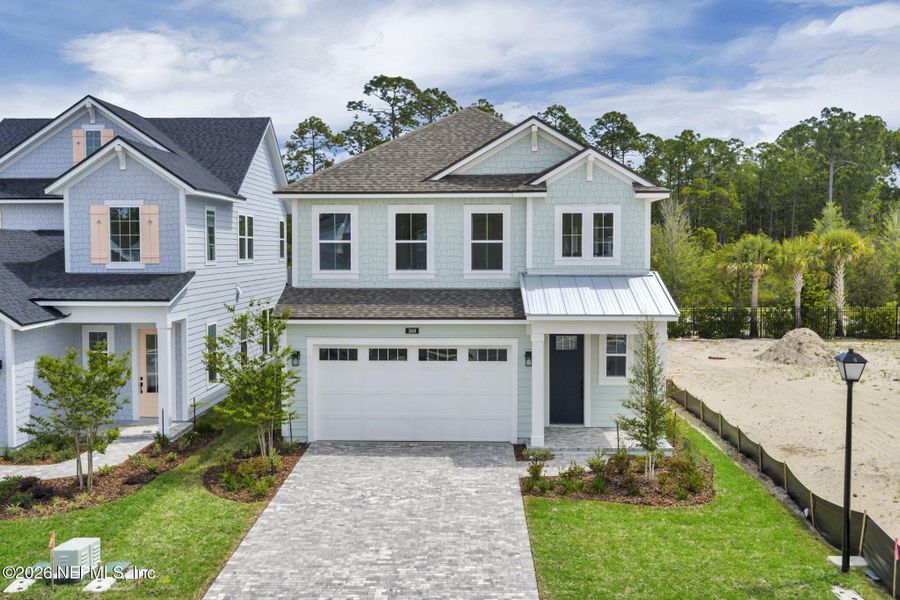 Front exterior of a new home in Seabrook Village at Seabrook, Nocatee, FL, highlighting curb appeal (Image 26).