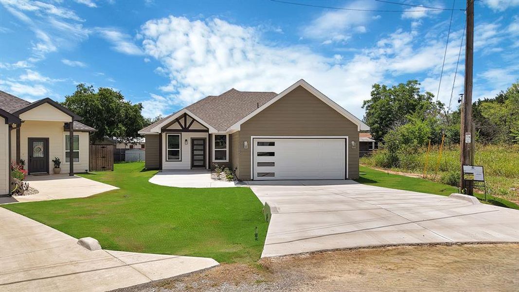 Front exterior of a new home in , Granbury, TX, highlighting curb appeal (Image 19). Front exterior of a new home in , Granbury, TX, highlighting curb appeal (Image 19).