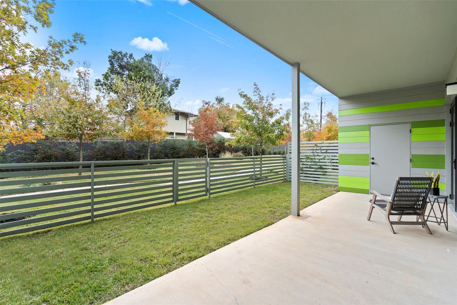 View of patio with fence