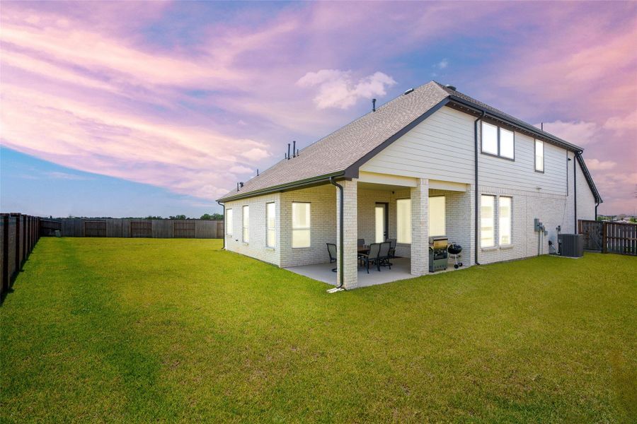 Step into your private outdoor retreat .This oversized backyard boasts a spacious covered patio and a lush lawn, all enclosed by a privacy fence for the perfect blend of comfort and seclusion. Step into your private outdoor retreat .This oversized backyard boasts a spacious covered patio and a lush lawn, all enclosed by a privacy fence for the perfect blend of comfort and seclusion.