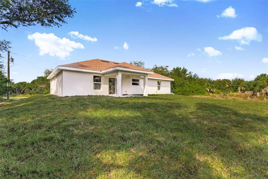 Exterior details and patio area of a home in , Port Charlotte (Image 3).