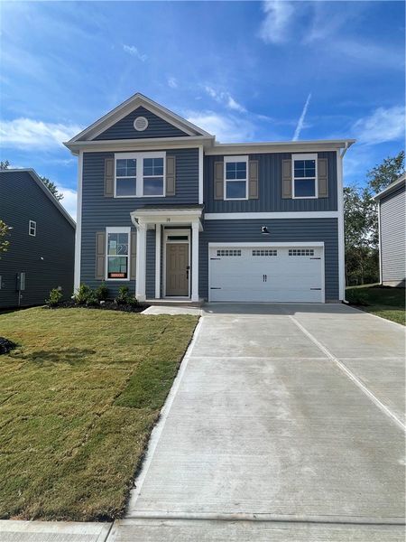 Exterior details and patio area of a home in Springwood Grove, Central (Image 2).