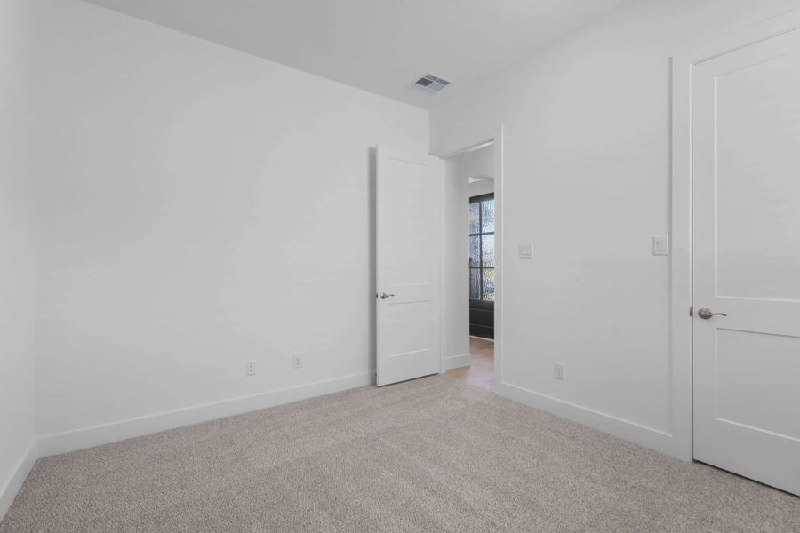 Representative unfurnished interior of a home built from the Lakeway by Chesmar Homes in Meridiana 50's, Manvel (Image 45).