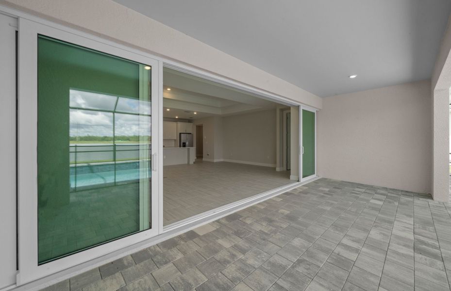 Exterior details and patio area of a home in Del Webb Oak Creek, North Fort Myers (Image 18).